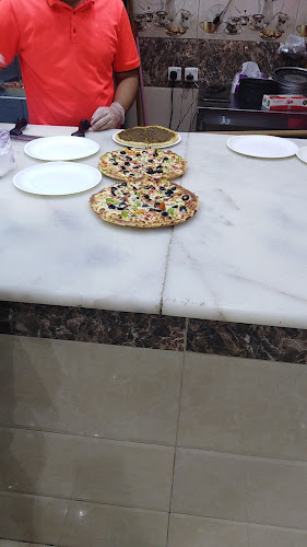 بيتزا هم - الضيافة