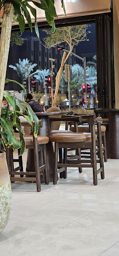 Qaf Coffee Roasters - محمصة ومقهى قاف