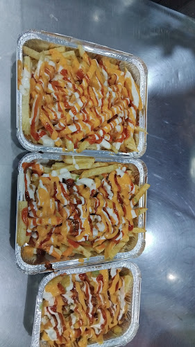 Opinii despre كافتيريا حمودي لعصير الجي والبطاطس în مكة - الضيافة