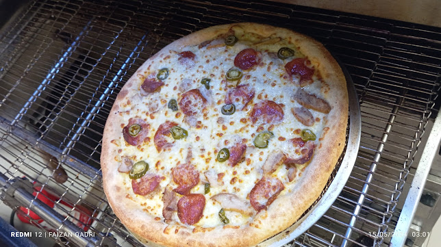 Lorenzo Pizza | لورينزو بيتزا - الضيافة