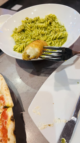 Pizza il Mio - الضيافة