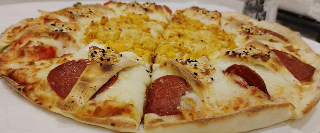 شارع أبو بكر الصديق، الفيصلية، الدمام 32271