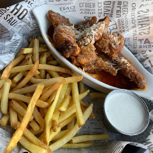 Buffalo Wings & Rings - الضيافة