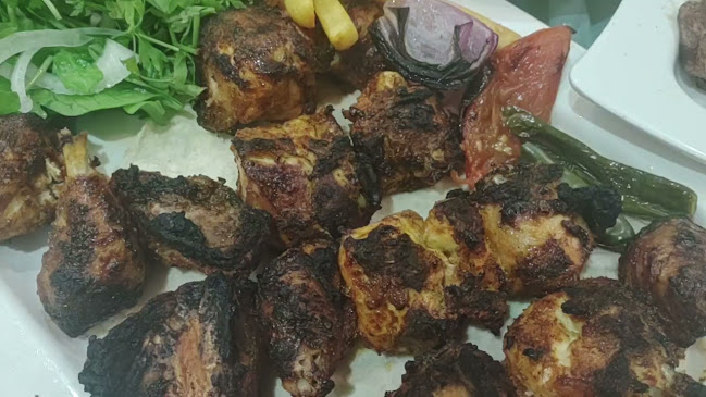 مطعم صحن مشوي - الضيافة