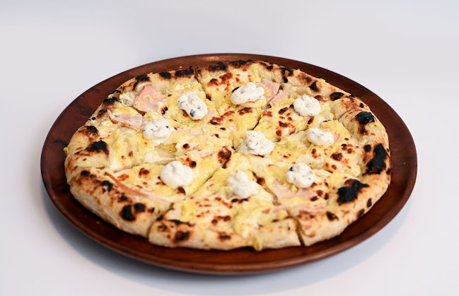 مطعم شاورما وبيتزا - الضيافة