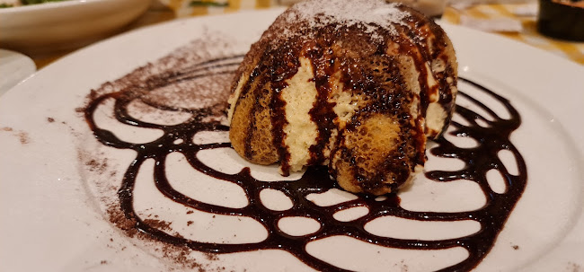 بورتو فينو كويزين - الضيافة