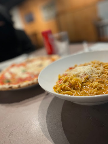 Pizza il Mio - الضيافة