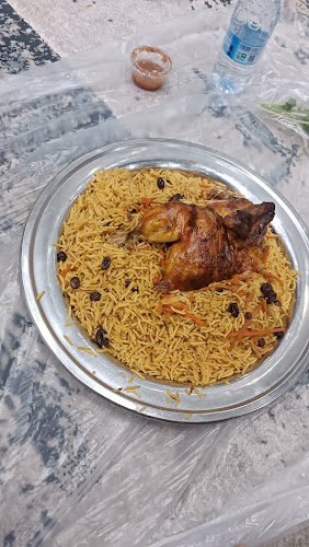 مطاعم نقطة ارز الحمراء البخاري - الضيافة