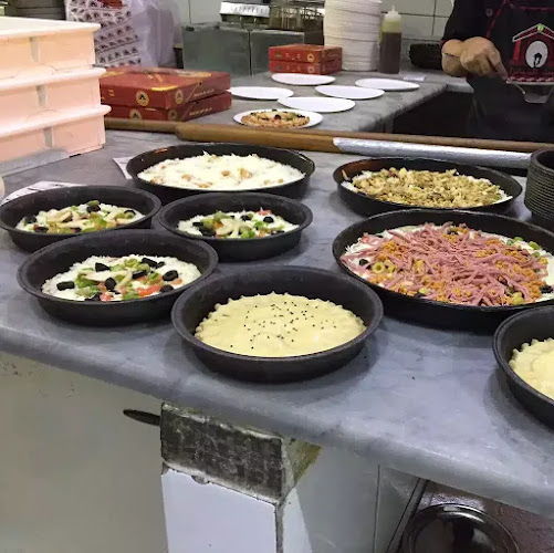 بيت البيتزا - الضيافة