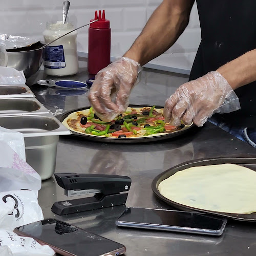 Opinii despre بيتزا رقائق التنور în الدمام - الضيافة