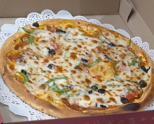 بيتزا رقائق التنور - الضيافة