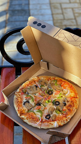 يم يم بيتزا (فرع الرس) - الضيافة