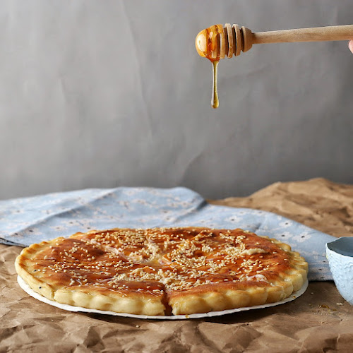 يم يم بيتزا (فرع الرس) - الرس