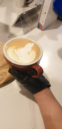 رايق RAEQC Coffee - الضيافة