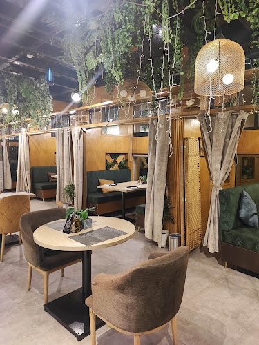 Opinii despre مطعم و كوفي ايلاند în املج - الضيافة