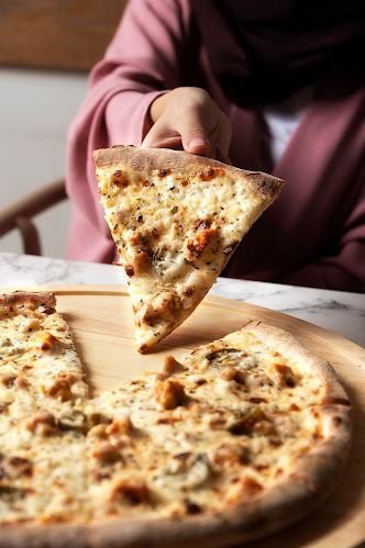 Opinii despre هاريز بيتزا în الرياض - الضيافة