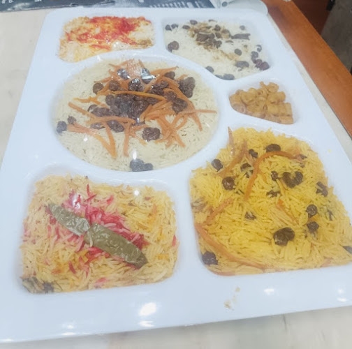 مطاعم نقطة ارز الحمراء البخاري - الرياض
