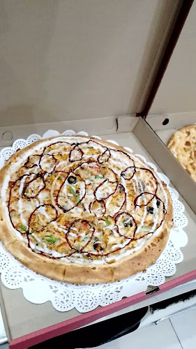 حي، شارع عبدالرحمن بن عوف، الندى، الدمام 12345