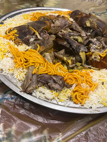 مطعم حي المطار البخاري