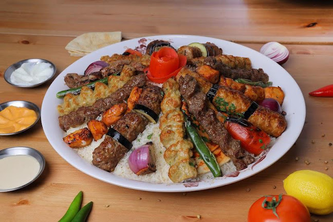 مطاعم مشويات الحمراء فرع فلسطين