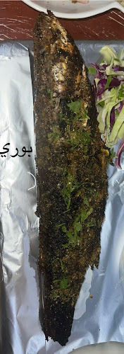 شاطئ الصيادالملز للمأكولات البحريه - الرياض