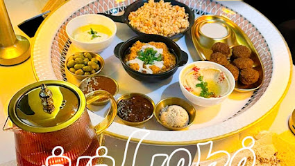 Moons & Tunes Restaurant & Cafe. مطعم ومقهي مونز اند تونز كافيه