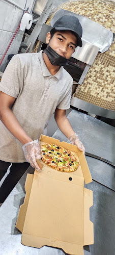 Opinii despre بيتزا هاوس în مكة - الضيافة