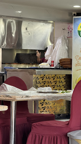 مطاعم نقطة ارز الحمراء البخاري - الضيافة