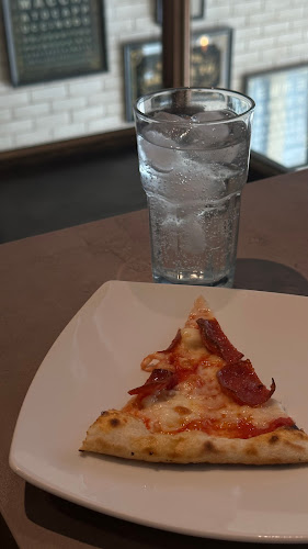 Pizza il Mio - الضيافة