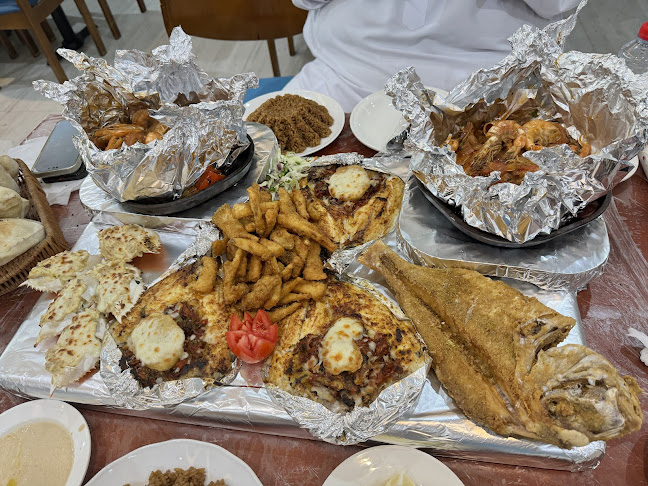 شاطئ الصيادالملز للمأكولات البحريه - الرياض