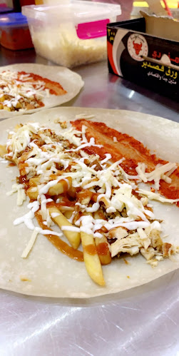 مشويات وشاورما ع الماشي