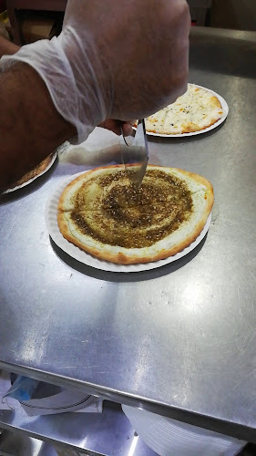 بيتزا ومناقيش الرمانه الدمشقيه - الضيافة