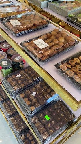 حلويات بقداش بوظة بقداش شارع القدس - الضيافة