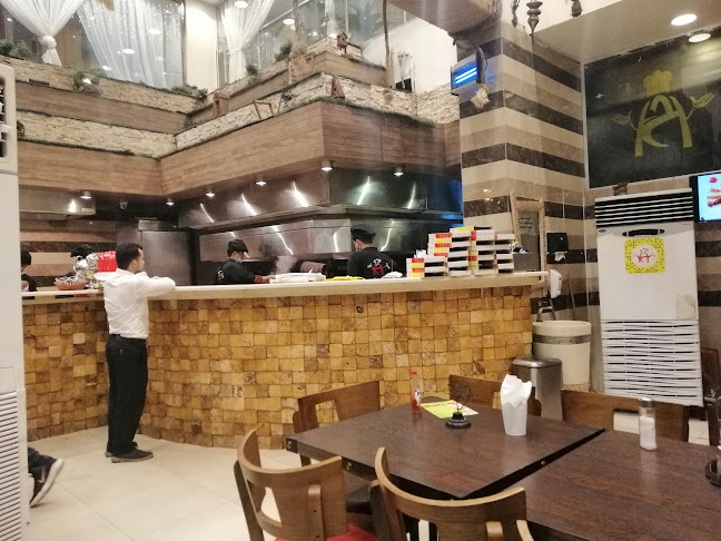 مطاعم مشويات الحمراء فرع فلسطين