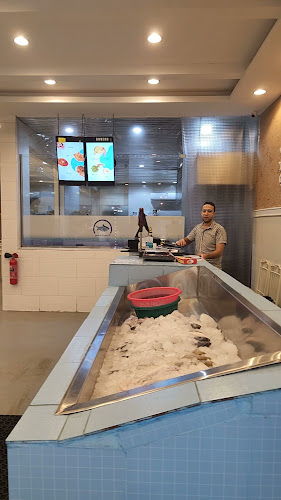 مطعم اكبس بالخمس للأكلات البحريه