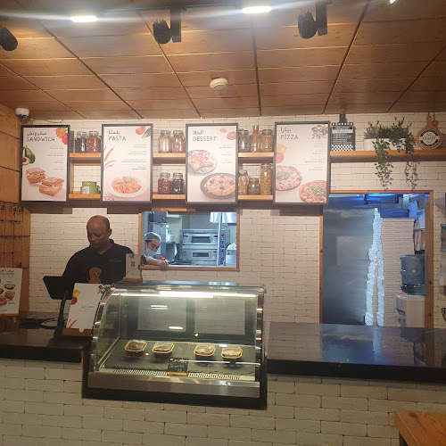 La Casa Pizza - الضيافة