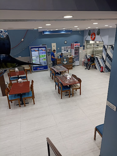 شاطئ الصيادالملز للمأكولات البحريه - الرياض