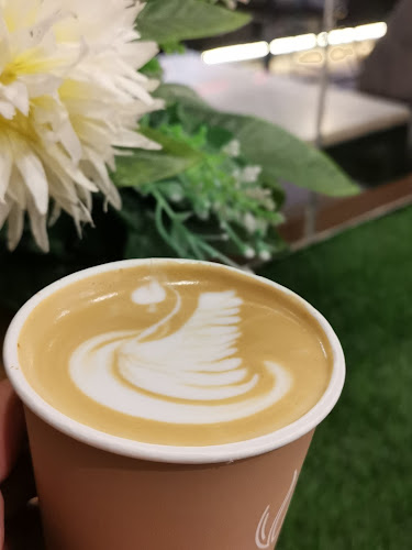 مقهى ومحمصة لذة البن