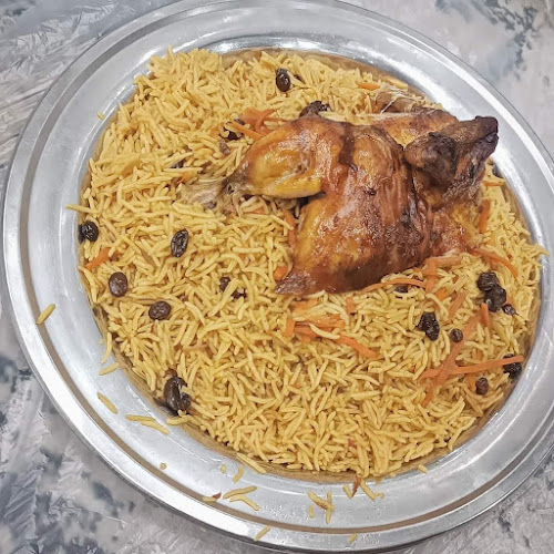 مطاعم نقطة ارز الحمراء البخاري - الرياض