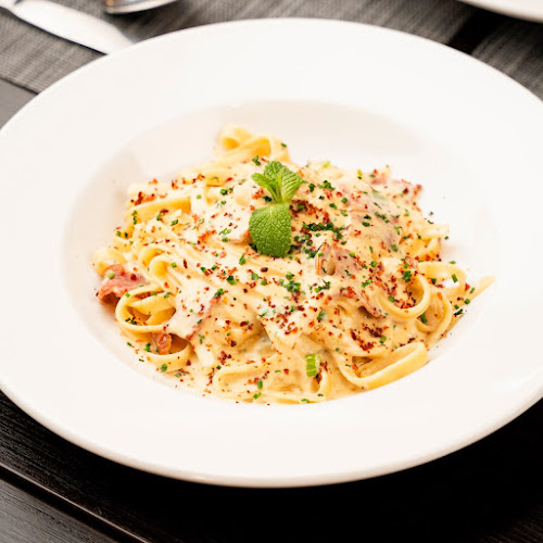 Pizzarica DQ - الضيافة