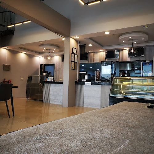 حي، شارع الإمام محمد بن عبدالوهاب، طيبة، الدمام 32211