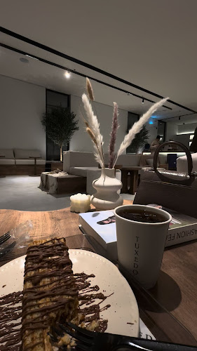 Comentarii opinii despre توكسيدو كوفي