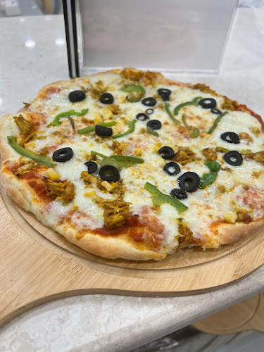 بيتزا وفطائر كيرم