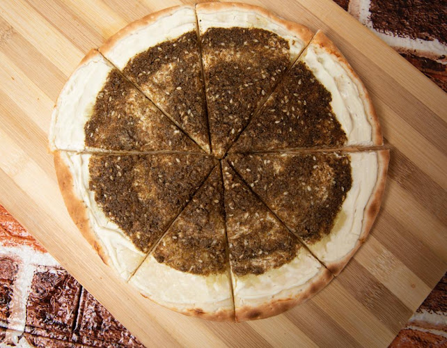 شيخ البيتزا والمناقيش - الضيافة