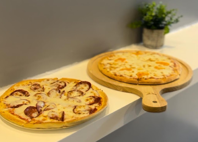 Opinii despre مطعم ومعجنات ماما خباز în الخبر - الضيافة