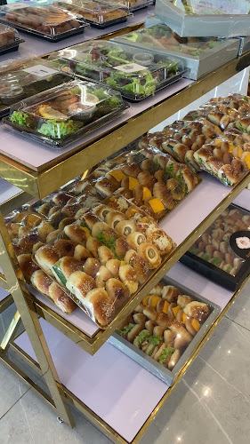 حلويات بقداش بوظة بقداش شارع القدس - القطيف‎