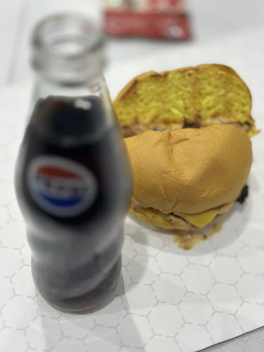 High برجر عالحطب - الضيافة